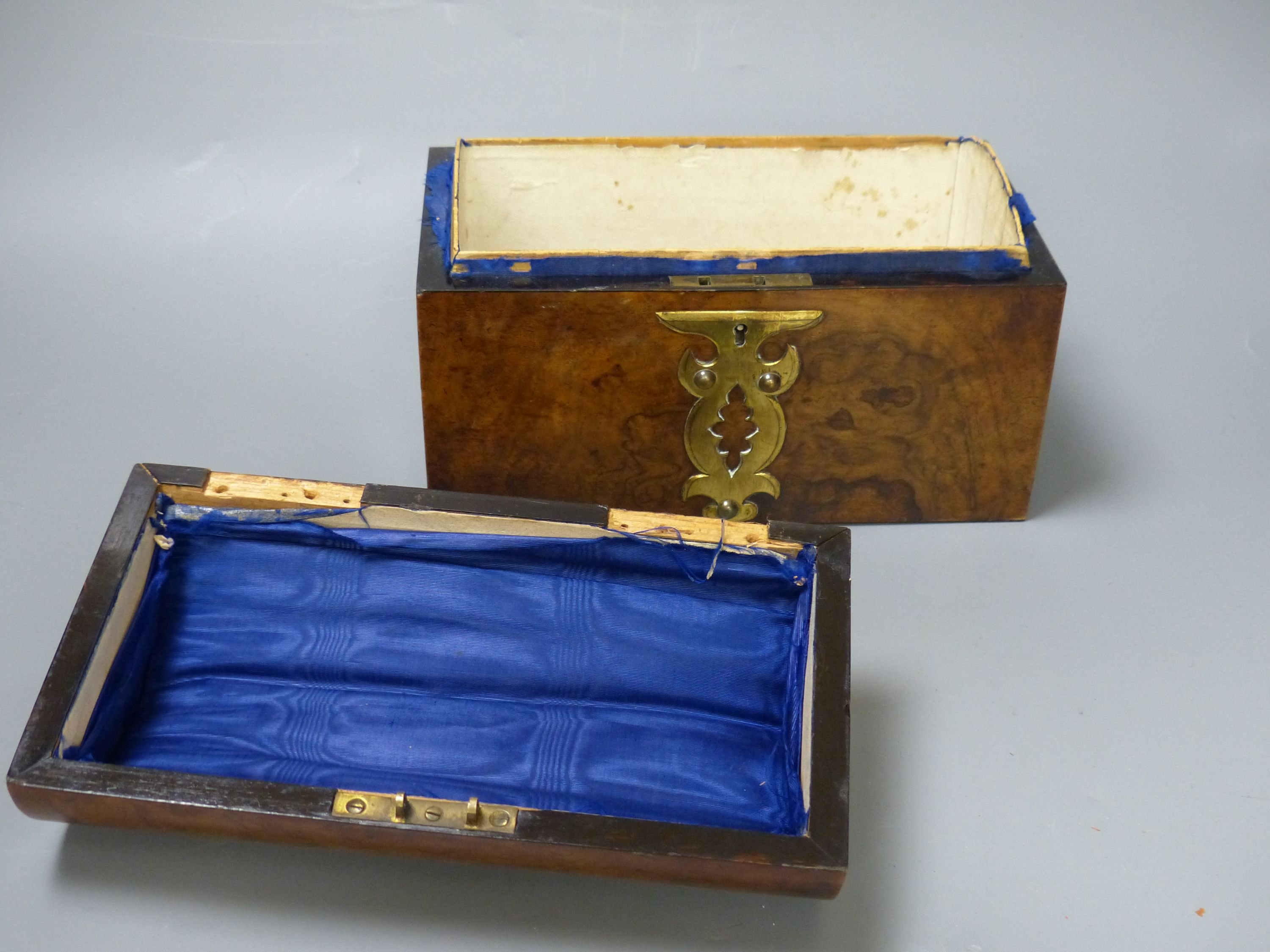 A Victorian dome topped brass mounted box and mother of pearl inlaid sewing box lined with blue silk